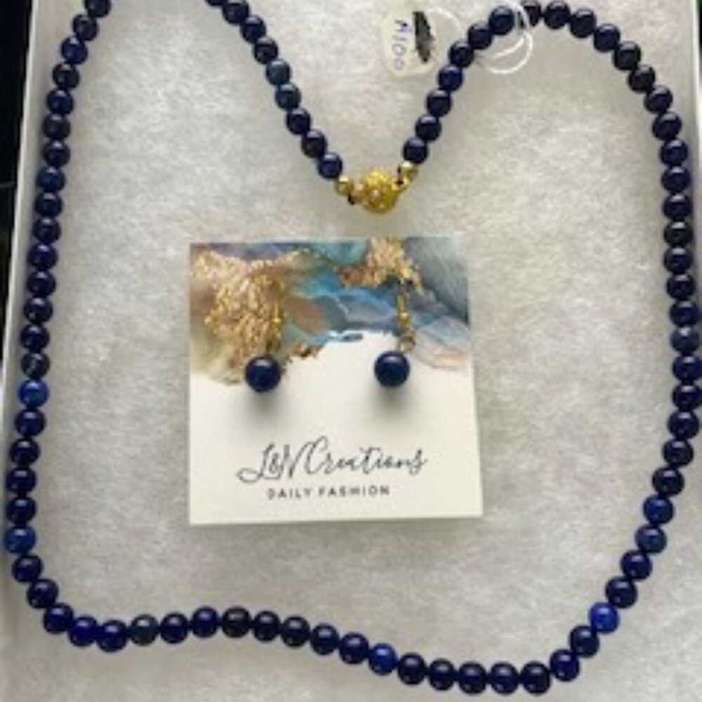 Deep blue lapis lazuli with gold findings and earrings to match
